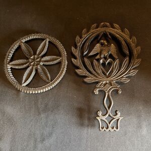 Lot of 2 Vintage Solid Cast Iron Trivets 1 Eagle & 1 Star